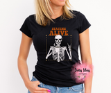 Staying Alive Skeleton Coffee Shirt | Funny Sarcastic Adult Unisex Tee | Caffeinated Skeleton Graphic T-Shirt | Retro Coffee Lover Gift