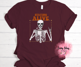 Staying Alive Skeleton Coffee Shirt | Funny Sarcastic Adult Unisex Tee | Caffeinated Skeleton Graphic T-Shirt | Retro Coffee Lover Gift